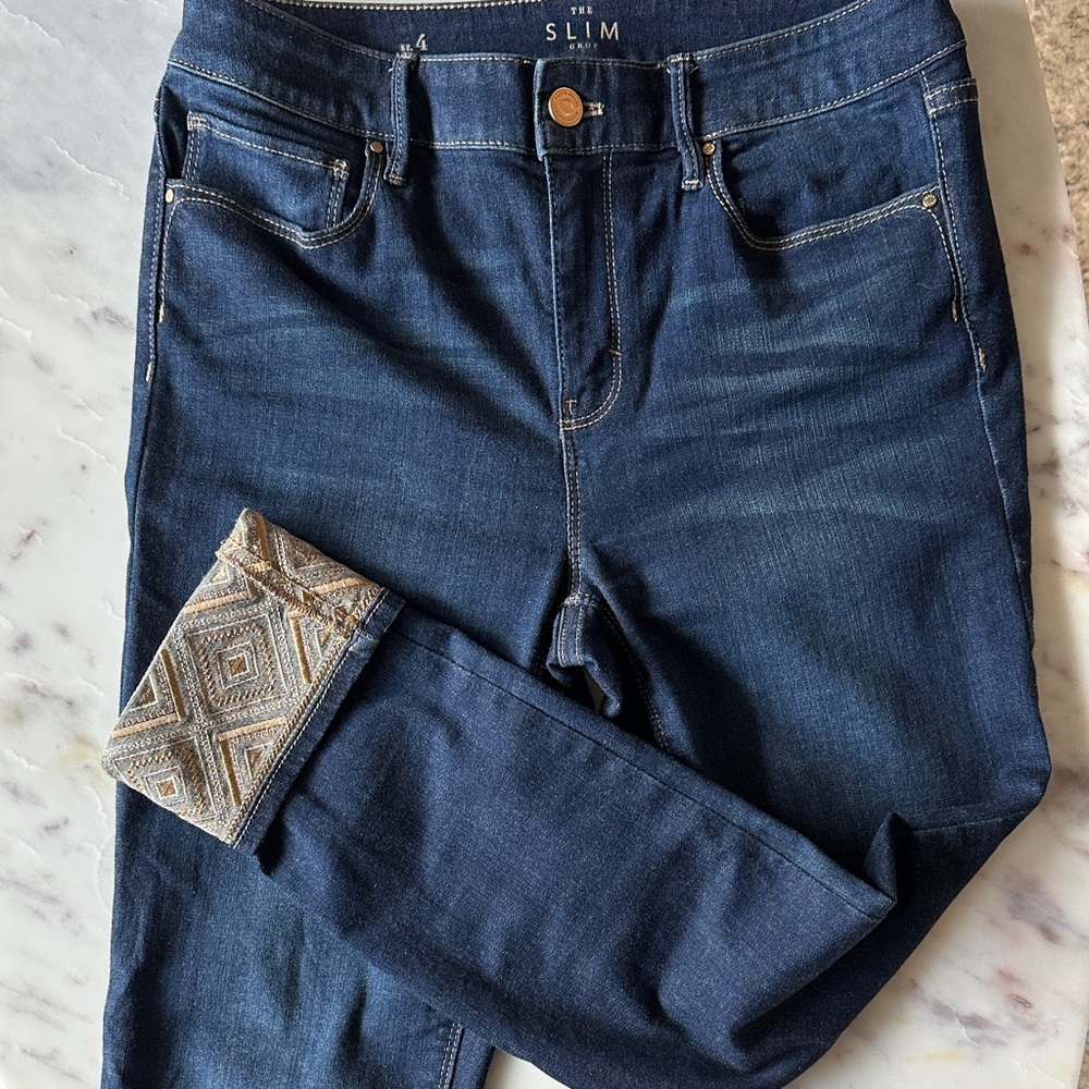 Stylish Dark Blue Jeans with Embellished Cuffs